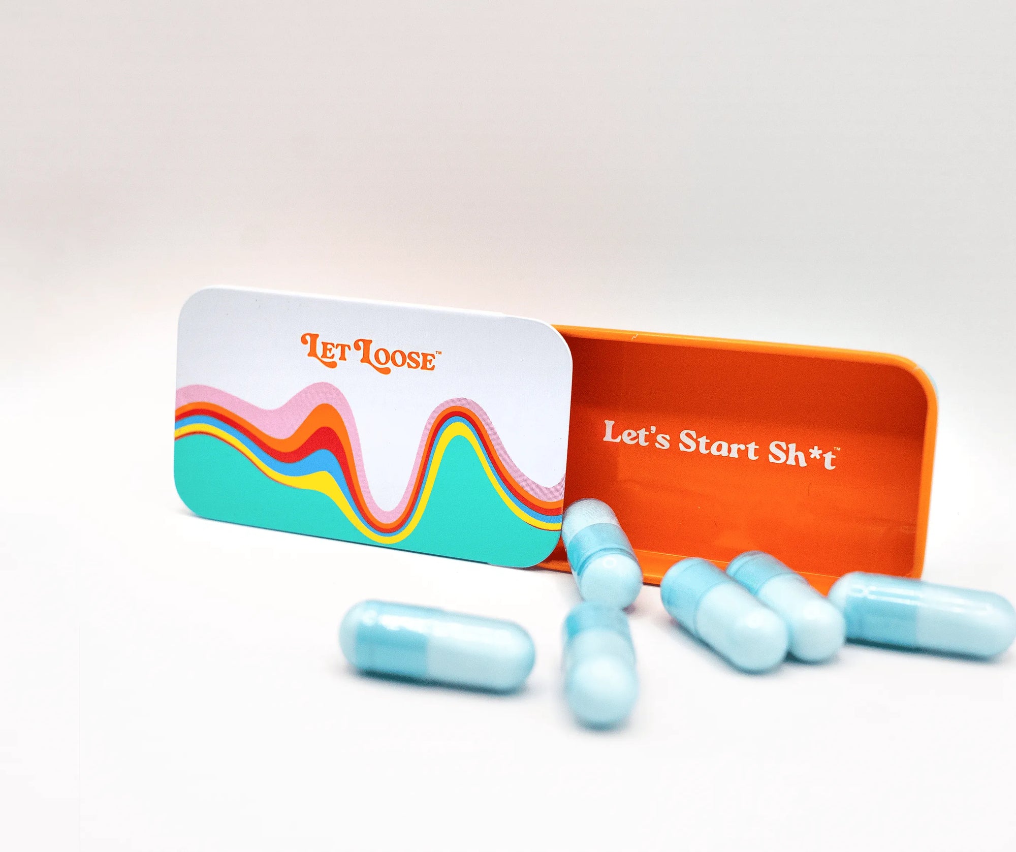 A colorful box labeled "Let Loose" with an open lid displaying the text "Let's Start Sh*t" 